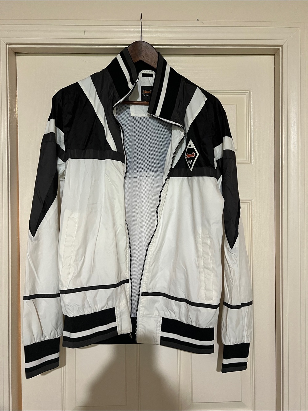 Vintage Le Tigre Men's Black & White Contrast Windbreaker with Diamond Badge